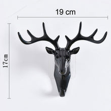 Self-adhesive deer head hanger for decorative use