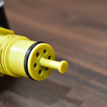 Gold colored trigger nozzle for hoses, durable and lever-operated for water.