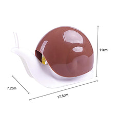 Snail-shaped liquid soap dispenser for travel and everyday use.